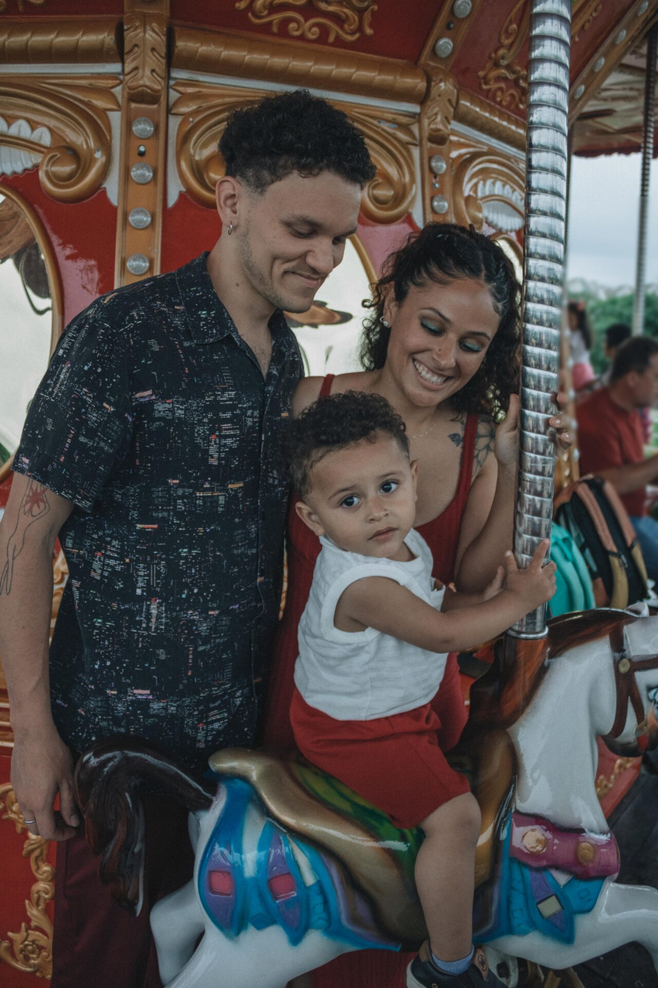 things to do in Pennsylvania with kids - family on carousel